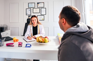 A professional lawyer consulting with a client in a modern office.